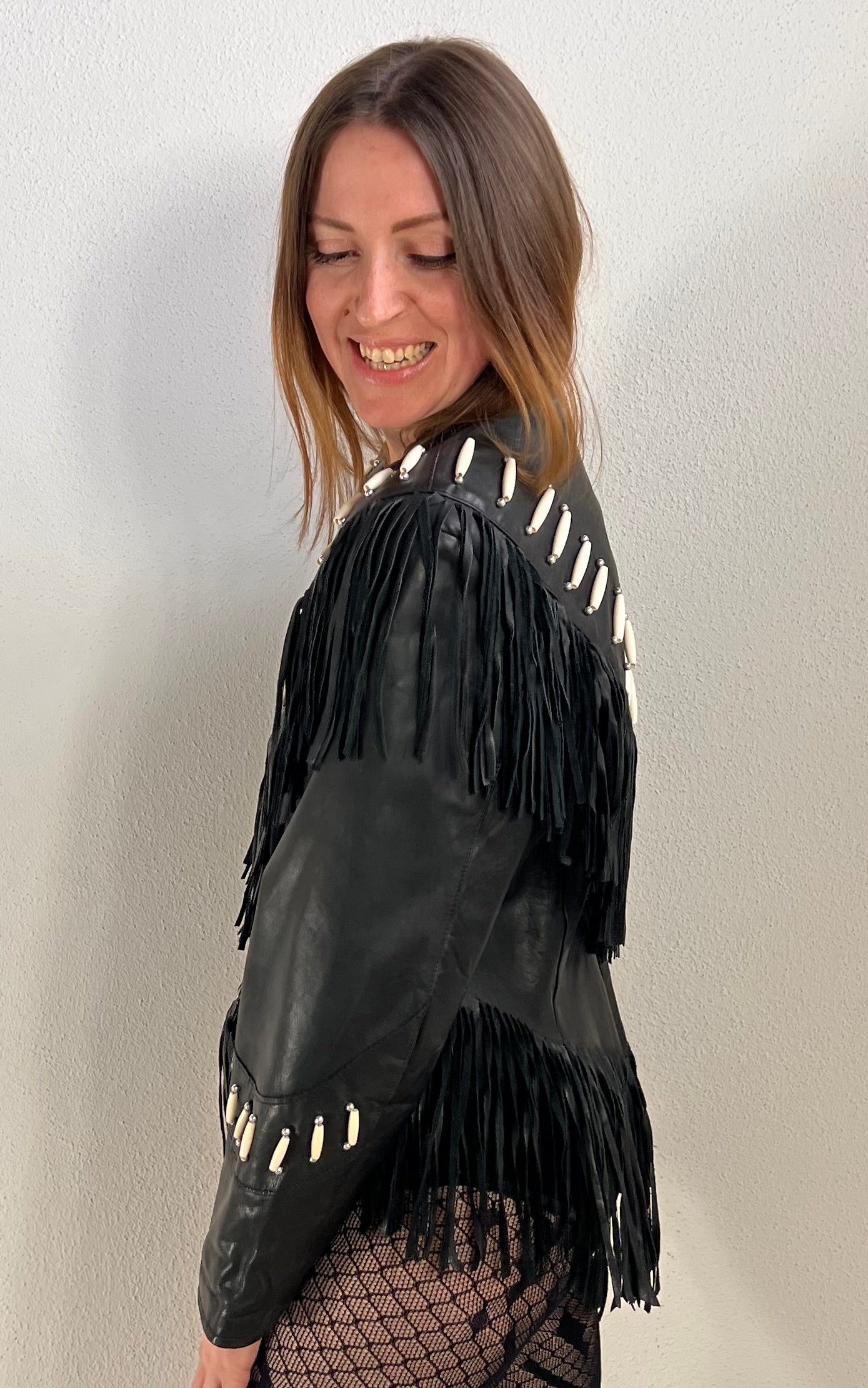 Vintage Black Leather Fringe Jacket with Bone Details